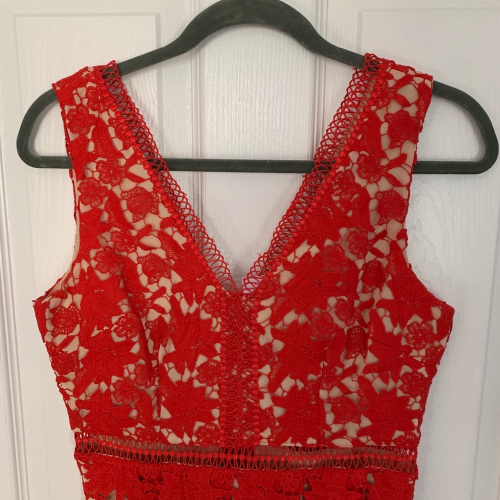 Red lace overlay cocktail dress.